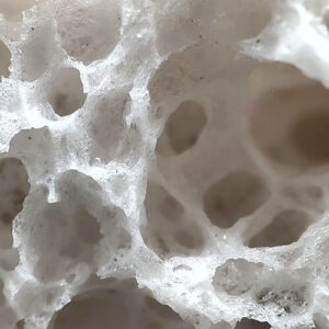 Close-up of Aqua Clean Bio Foam Stone showing its unique porous texture and interconnected structure for filtration.