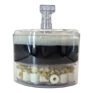 Corner filter for aquarium with filter sponges, ceramic rings, and decorative stones, ideal for efficient water filtration.