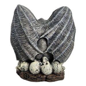 Gargoyle aquarium ornament featuring intricately designed shells and skulls for an enchanting underwater aesthetic.