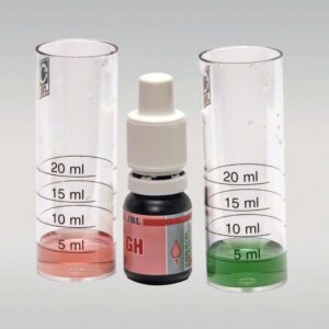 JBL GH Test Kit with cuvettes showing water samples in red and green to measure total hardness in freshwater aquariums.