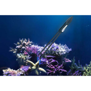Maxspect Coral Tweezer hovering in colorful coral reef, showcasing neutral buoyancy and silicon-coated tips for delicate handling.