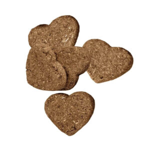 Heart-shaped baked treats made with high-fiber Timothy hay for small animals.