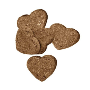 Heart-shaped baked treats made with wholesome ingredients for small pets like rabbits and guinea pigs.