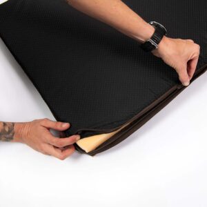Rogz Outdoor Flat Dog Bed showing hands adjusting the cover, emphasizing comfort and durability for outdoor use.