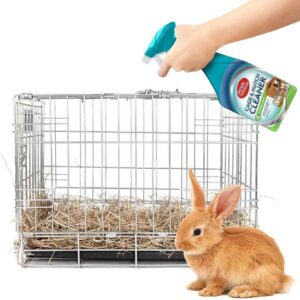 Simple Solution Cage and Hutch Cleaner being used to freshen a rabbit's hutch, featuring a rabbit and clean cage setup.
