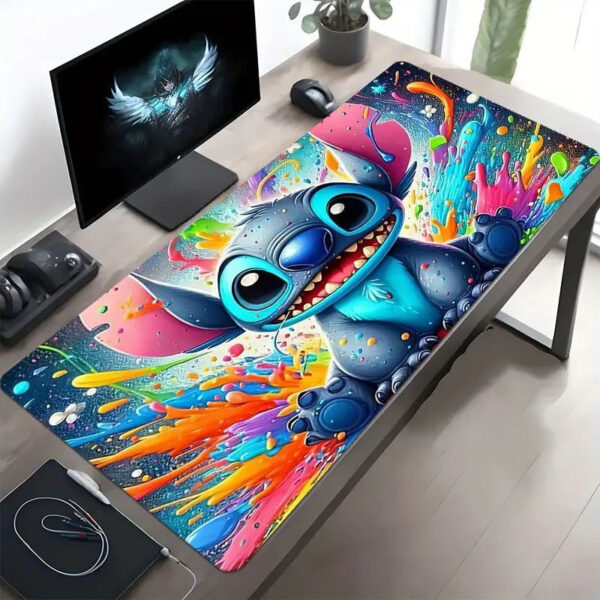 Vibrant Stitch mouse pad 80x40cm with colorful paint splatters, perfect for brightening up any desk.