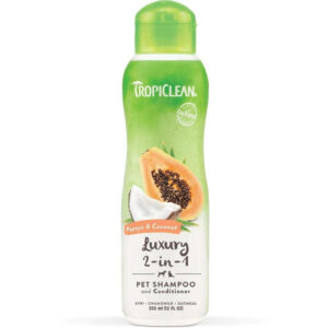 Tropiclean 2-in-1 pet shampoo and conditioner with papaya and coconut, 355ml bottle for luxurious pet care.