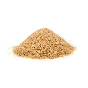 Pile of wheat bran used as nutritious worm chow for mealworms and superworms, ideal for healthy insect feeding.
